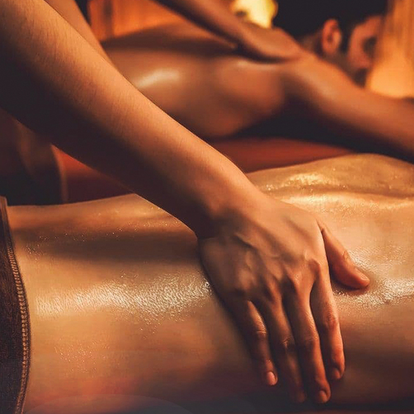 The process of performing a couple massage with female hands